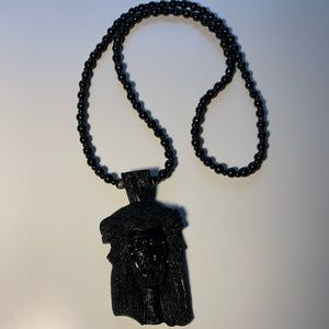 Jesus piece in black wood